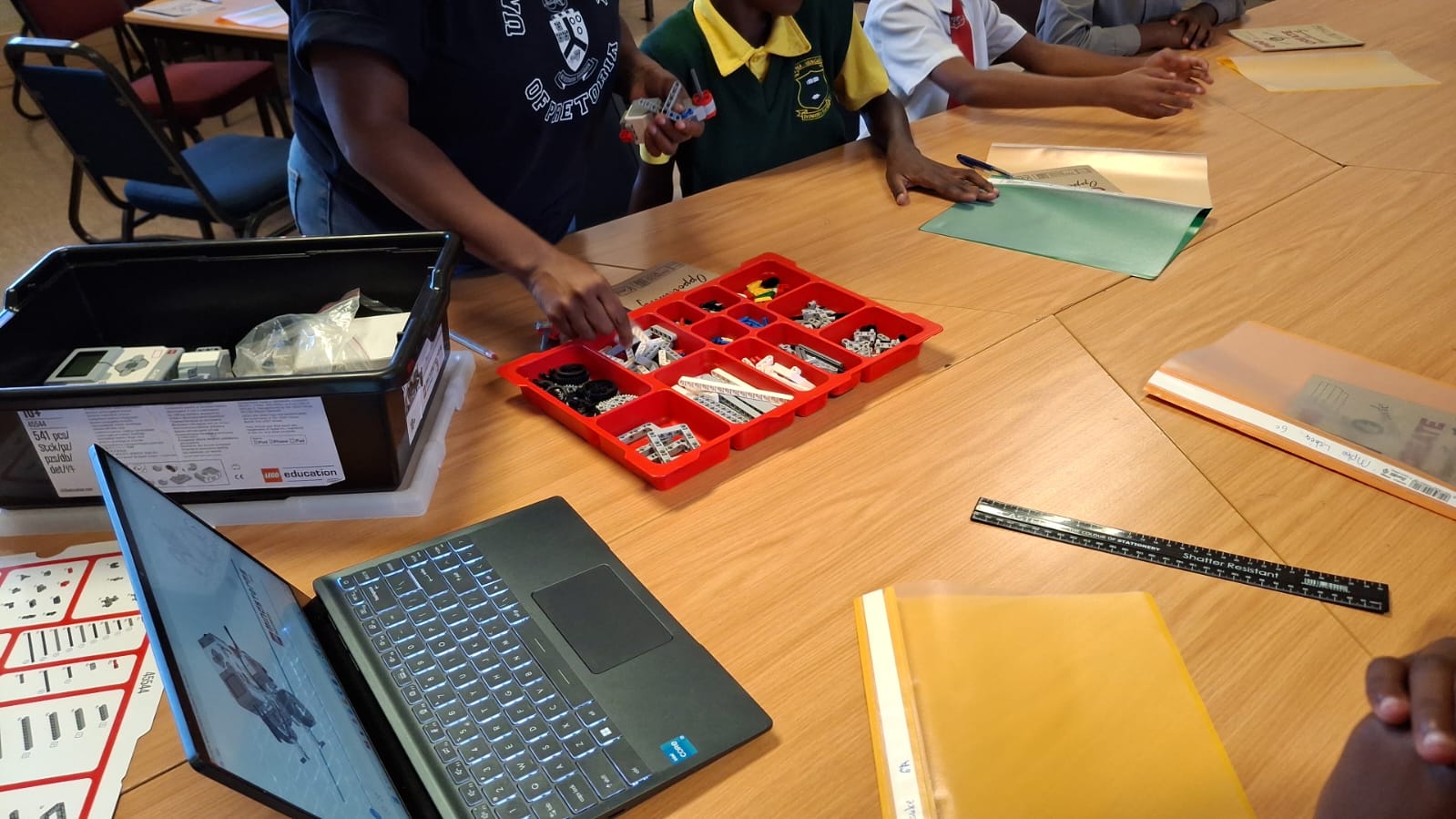 Learners building with LEGO